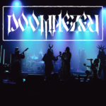 Doomnezeu se alătură Wormholedeath și dezlănțuie povestea întunecată a „Spânului”